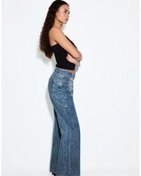 Stradivarius - Leopard Print Straight-leg Jeans With Rhinestones - Lyst