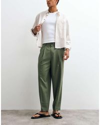 ASOS - Oversized Toelopende Geplooide Zomerbroek Van Wol - Lyst