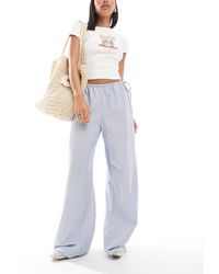 ONLY - – weit geschnittene hose mit en streifen und kordelzugbund - Lyst