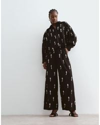 ARRANGE - Wide Leg Pleated Embellished Trousers Co-ord - Lyst