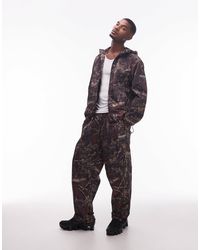No Problemo - – hose aus nylon mit dunklem, digital verzerrtem real tree-military-muster, kombiteil - Lyst