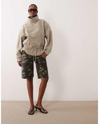 Lioness - Penny Exclusive Asymmetric Button Detail Relaxed Leg Jorts - Lyst