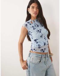 Motel - Jiwon Tie Neck Flocked Top - Lyst