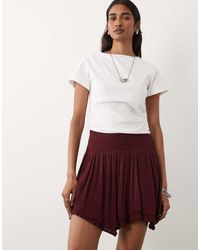 Miss Selfridge - Shirred Waist Hanky Hem Mini Skirt - Lyst