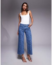 GOOD AMERICAN - Vaqueros Capri De Corte Palazzo Con Estampado De Flores De Hibisco Good Waist De -Rosa - Lyst