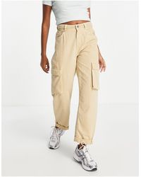 Slacks and Chinos Cargo trousers Womens Clothing Trousers Bershka Cotton Petite Pocket Detail Slim Leg Cargo Trouser in Natural 