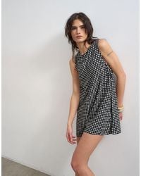 TOPSHOP - Chuck On Boxy Playsuit - Lyst