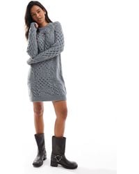 Tommy Hilfiger - – gestricktes mini-pulloverkleid - Lyst