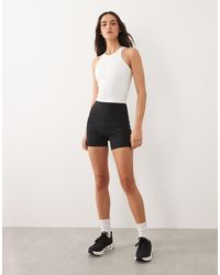 4505 - Icon Active Racerback Singlet With Inner Bra And Removable Padding - Lyst