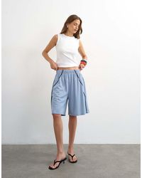 TOPSHOP - Longline Piping Detail Sports Shorts - Lyst