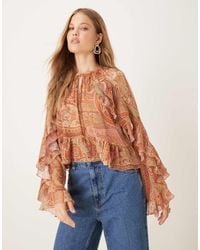 Mango - – bluse mit paisleymuster und trompetenärmeln - Lyst