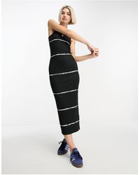 Weekday - Exclusivité asos - - close - robe ajustée longueur mollet en tissu côtelé effet tie-dye - noir - Lyst