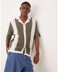ASOS - Gebreide Ruimvallende Polo Met Knoopsluiting En Reverskraag - Lyst