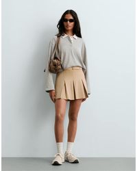 Oysho - High-rise Pleated Short Skirt With Belt - Lyst