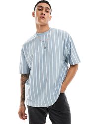 ASOS - T-shirt oversize à rayures verticales - bleu - Lyst