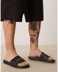 Calvin Klein - Logo Sliders - Lyst