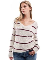 Hollister - Gebreide Trui Met V-Hals En Icoonlogo En Strepen - Lyst