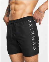 Gym King - Pantaloncini da bagno neri con logo tono su tono - Lyst