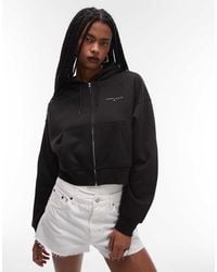 Tommy Hilfiger - Sudadera Negra De Corte Cuadrado Con Capucha Y Cremallera De - Lyst