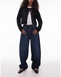 TOPSHOP - Gestreepte Jeans Met Halfhoge Taille En Wijde Ronde Pijpen - Lyst