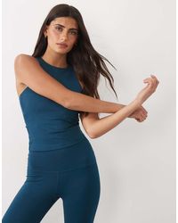 4505 - Icon Active Racerback Tank Top With Inner Bra And Removable Padding - Lyst