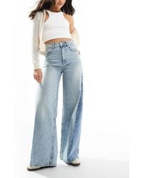 ASOS - – jeans mit weitem bein, hohem bund, zuglasche und verdrehter ziernaht im patchwork-design - Lyst