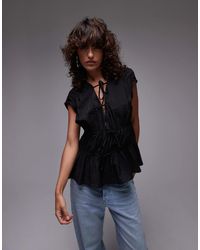 TOPSHOP - Sleeveless Tie Front Tiered Top - Lyst