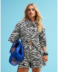 ASOS - – kurzärmliges top aus denim mit zebramuster und betonter taille, kombiteil - Lyst
