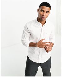 Hollister - Camisa oxford blanca con bolsillo y logo - Lyst