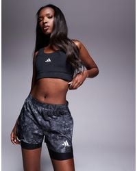 adidas Originals - Adidas running – own the run – 2-in-1-shorts mit em muster - Lyst