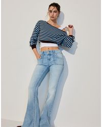 Stradivarius - Low-rise Jeans With Seam Pocket - Lyst