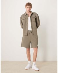 ASOS - Oversized Co-ord Short With Woven Patch And Raw Edge - Lyst