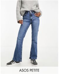 ASOS - Asos design petite - jeans a zampa medio - Lyst