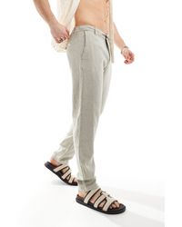 SELECTED - Pantalon ajusté coupe fuselée en lin - crème - Lyst
