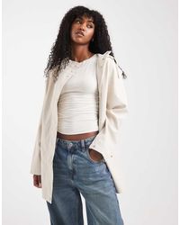 Vero Moda - Giacca Impermeabile Con Cappuccio Spalmata Color Pietra Moonbeam - Lyst