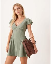 ASOS - Asos design petite - robe courte en velours côtelé avec taille corset et manches bouffantes - olive délavé - Lyst