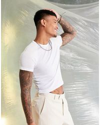 ASOS - T-shirt taglio corto attillata con maniche a contrasto bianche - Lyst
