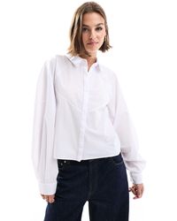 ASOS - Camicia bianca con spalle voluminose e dettaglio combinato - Lyst