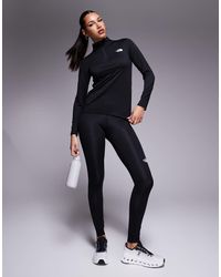 The North Face - Leggings Capri Deportivos Negros Con Logo Flex De Training - Lyst