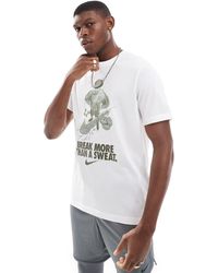 Nike - Camiseta Blanca De Manga Corta Con Estampado De Texto Dri-Fit De - Lyst