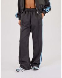 CERNUCCI - Taping Wide Leg Track Pant - Lyst