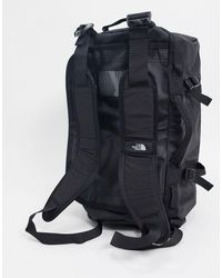 The North Face Base Camp Duffel Bag Extra Small 31 Litres In Sticker Print In Black For Men Lyst The North Face Base Camp Duffel Bag Extra Small 31 Litres In Sticker Print In Black For Men Lyst