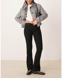 Gina Tricot - Low Rise Flare Leg Stretch Jeans - Lyst