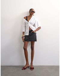 TOPSHOP - Denim Mini Pelmet Skirt - Lyst