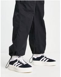 adidas Originals - Zapatillas blancas y negras con plataforma gazelle - Lyst
