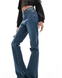 ASOS - Asos Design Tall Mid Rise Flare Jeans - Lyst