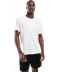 Nike - Camiseta Blanca Dri-Fit Miler De - Lyst