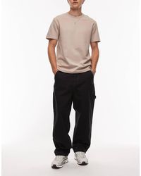 Timberland - – locker sitzende carpenter-hose aus schwerem canvas - Lyst