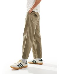 AllSaints - Pantalones verdes buck - Lyst
