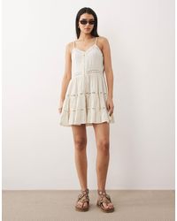 Iisla & Bird - Robe courte boutonnée - avoine - Lyst